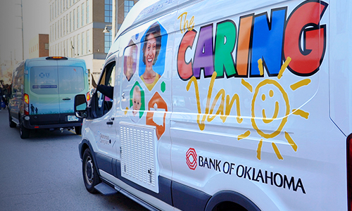 Care Van® driving down street in a parade