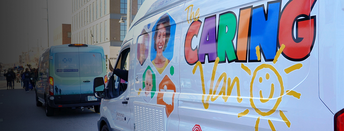 Care Van® driving down street in a parade