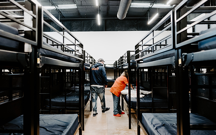 Rows of bunkbeds in a night shelter for housing insecure