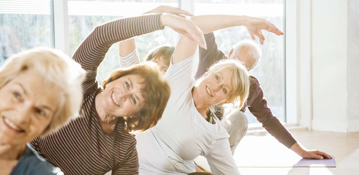 Retirees enjoy yoga