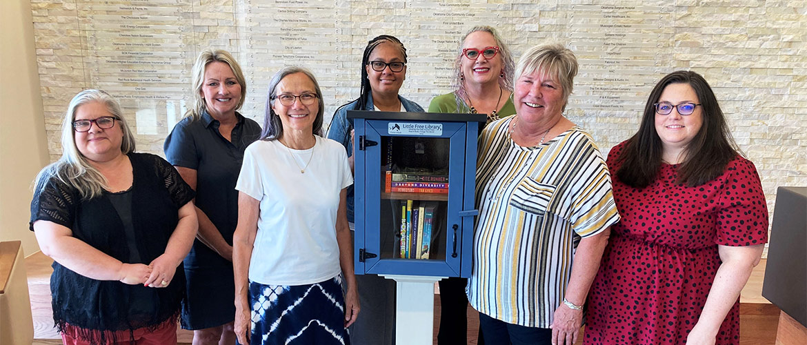 BCBSOK employees at free library program