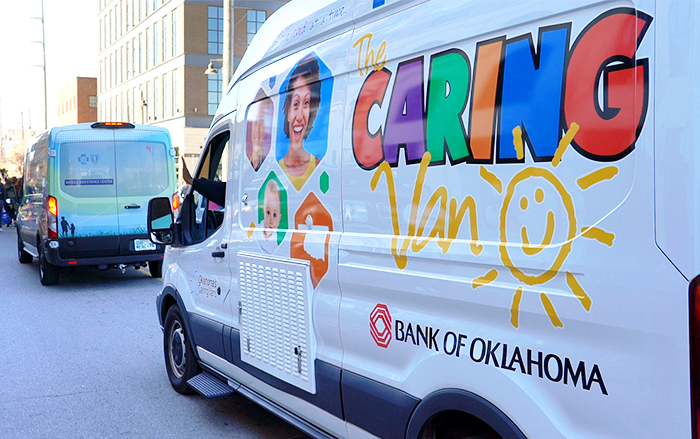 Care Van® driving down street in a parade