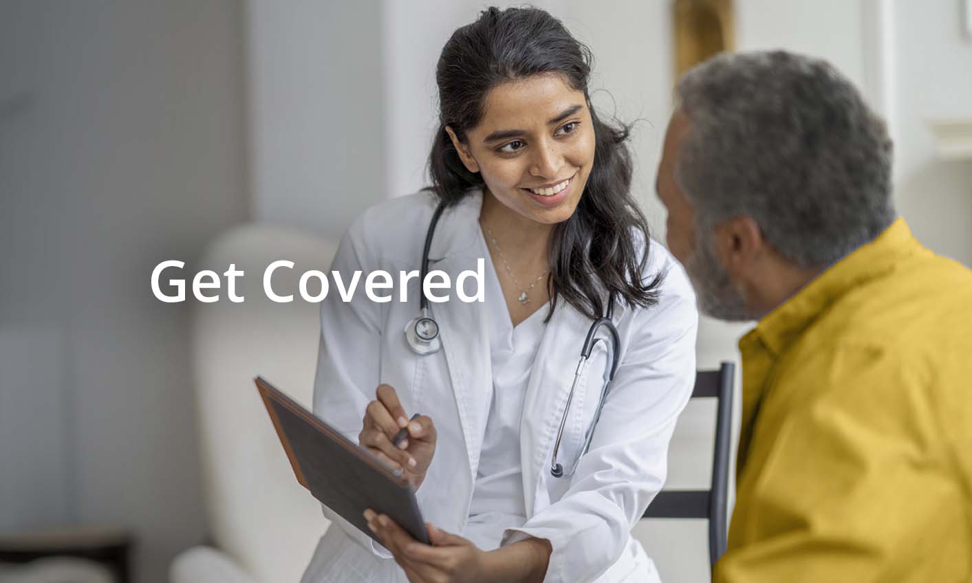 Patient and doctor speaking in a doctor's office